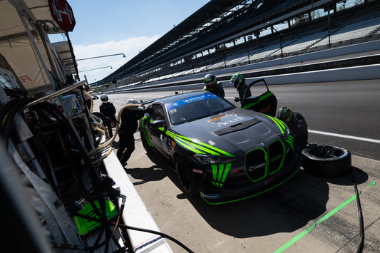 CarBahn with Peregrine Racing BMW M4 GT4 race car competing in the IMSA Michelin Pilot Challenge, showcasing the high-performance engineering available for street BMWs.