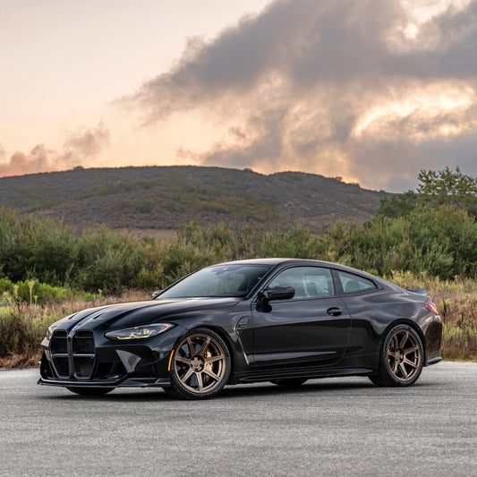 High-performance G-Series BMW with CarBahn Stage 1 Controller, upgraded intake, exhaust, and intercooler system for optimized tuning and cooling efficiency