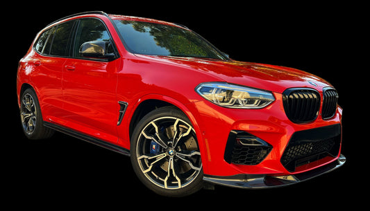 Upgraded BMW brake system featuring performance pads, two-piece rotors, stainless lines, and high-temperature racing fluid.