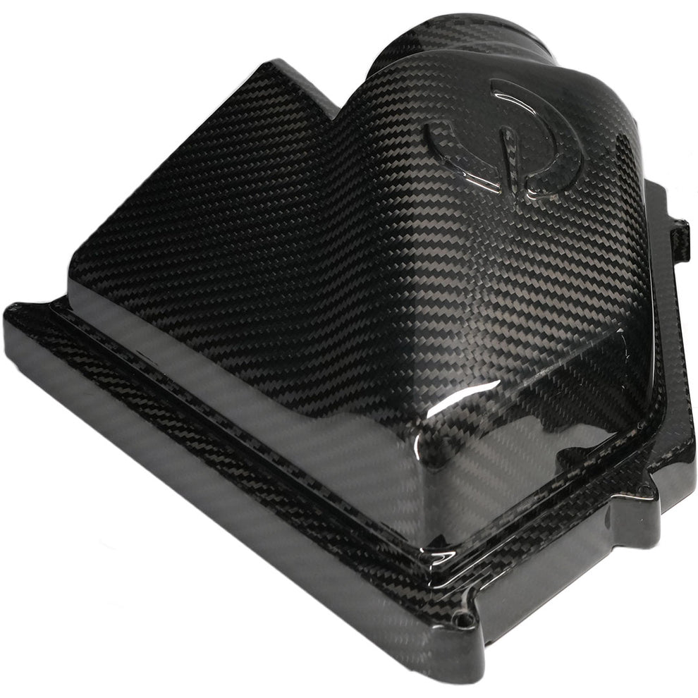 Close-up of CarBahn Carbon Fiber Intake Lid for BMW G8X showing weave and finish