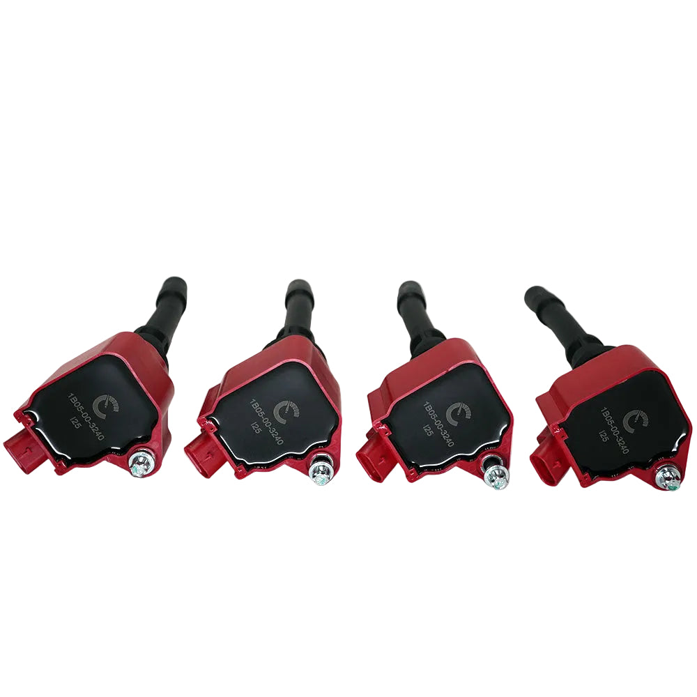 Four red and black ignition coils on a white background