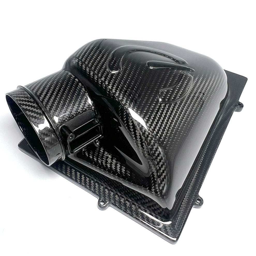 Close-up of CarBahn X3 X4 M40i intake hardware